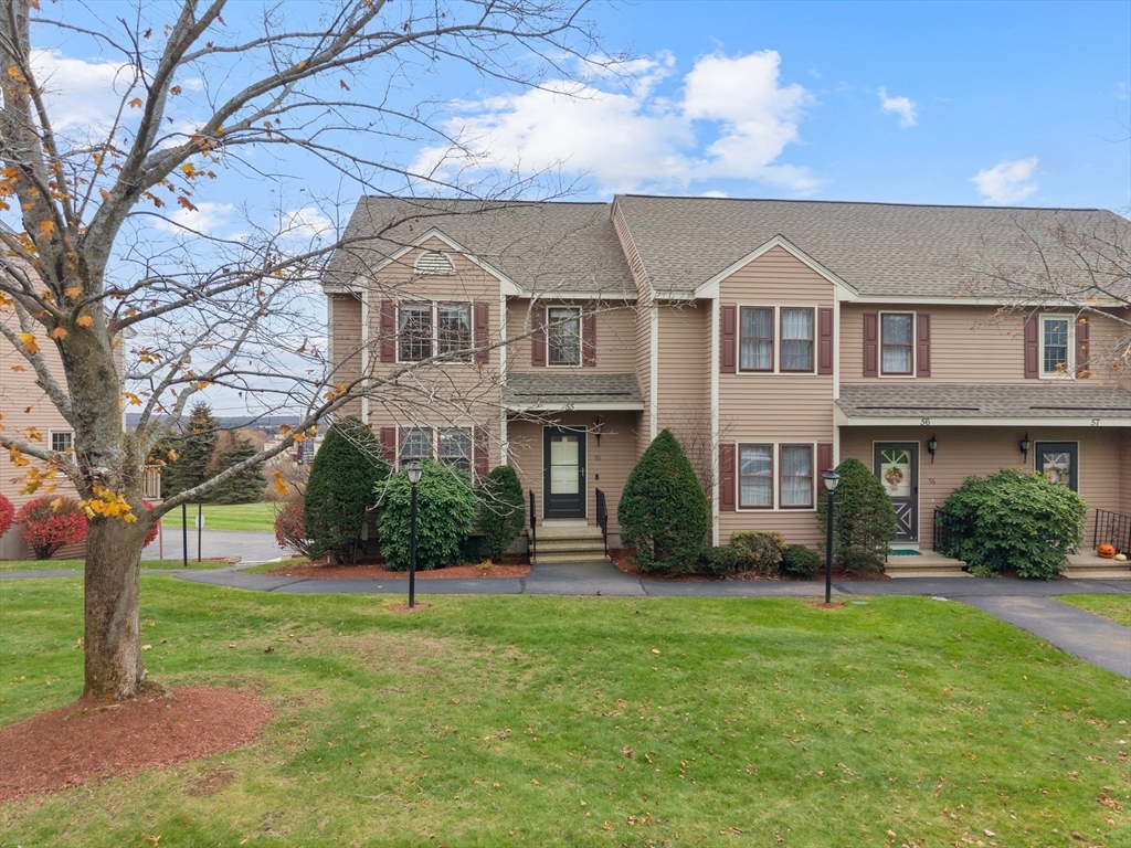 45 Washington Street, Unit 55 Methuen, MA 01844 - Photo 3 of 36 a front view of a house with a yard