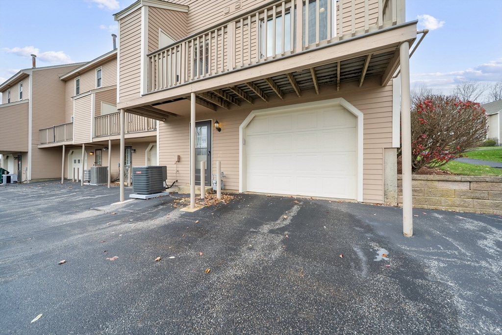 45 Washington Street, Unit 55 Methuen, MA 01844 - Photo 33 of 36 a view of a house with a street