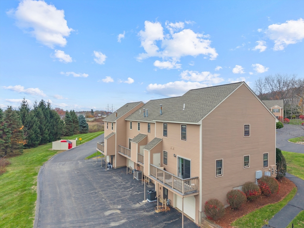 45 Washington Street, Unit 55 Methuen, MA 01844 - Photo 35 of 36 a view of a house with a yard