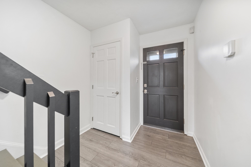 45 Washington Street, Unit 55 Methuen, MA 01844 - Photo 4 of 36 a view of an empty room with closet and mirror