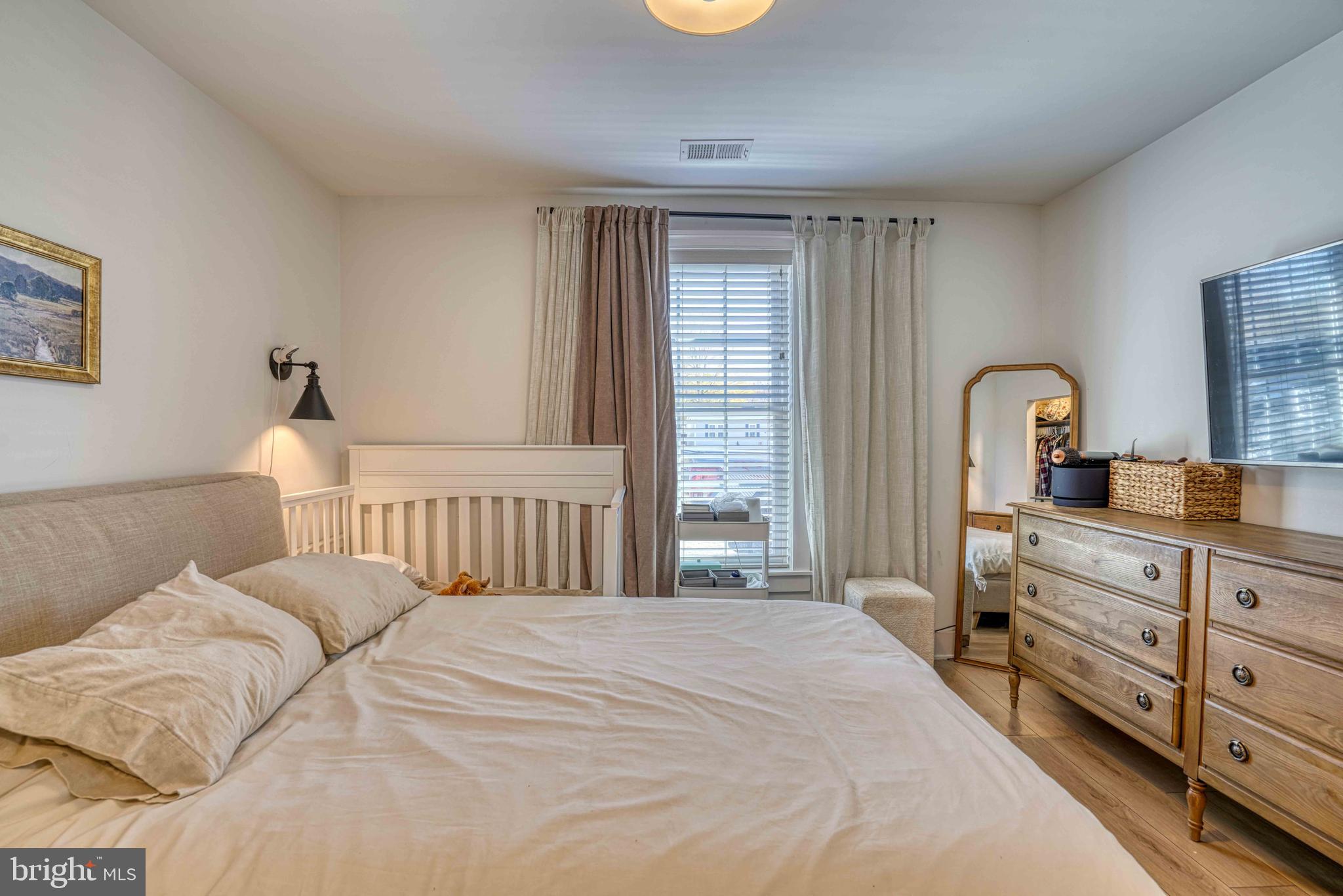 3540 Houston Branch Road Federalsburg, MD 21632 - Photo 13 of 35 a bedroom with a bed next to a window with outer view