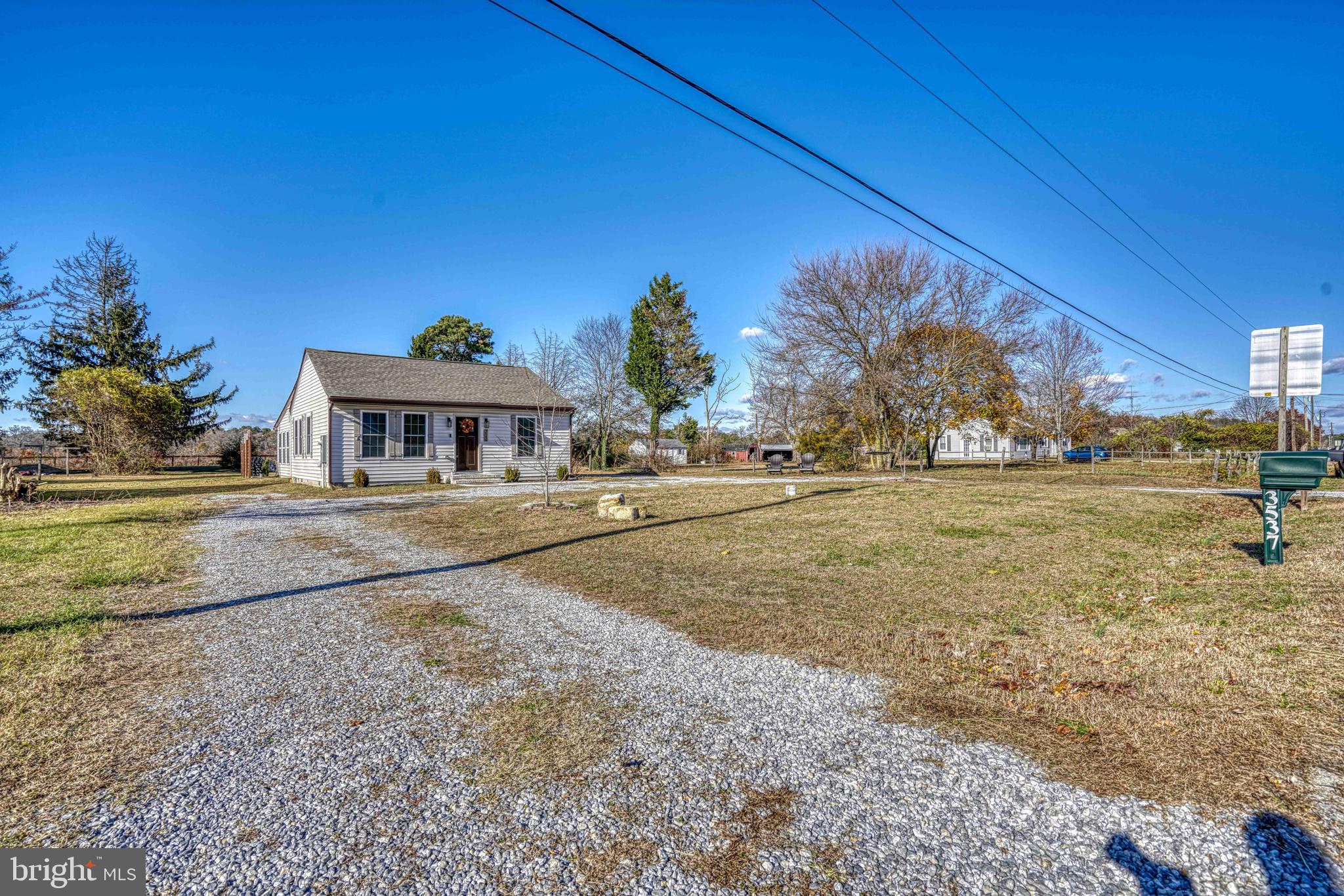3540 Houston Branch Road Federalsburg, MD 21632 - Photo 2 of 35 a front view of a house with a yard