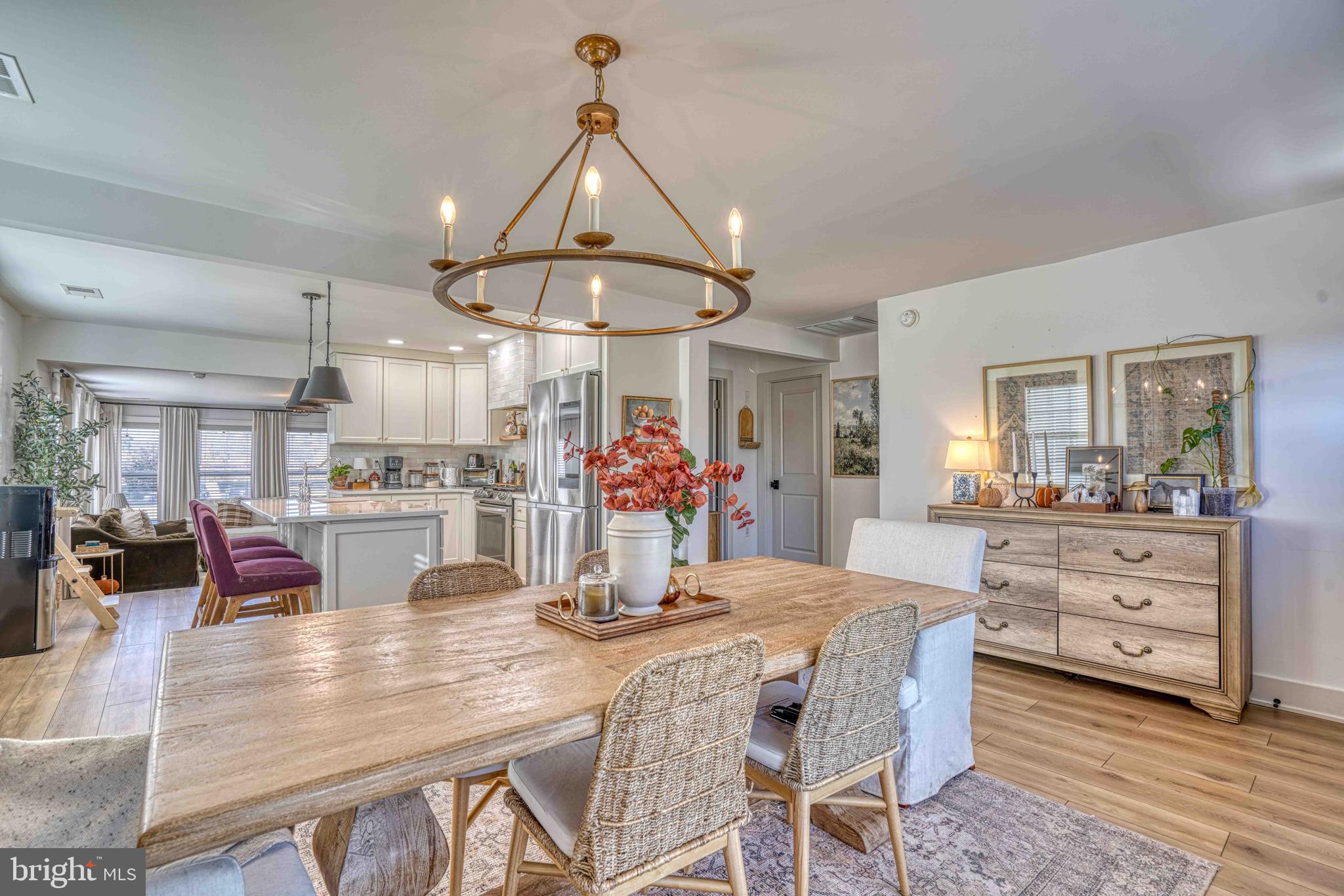3540 Houston Branch Road Federalsburg, MD 21632 - Photo 22 of 35 a kitchen and a dining room with wooden floor