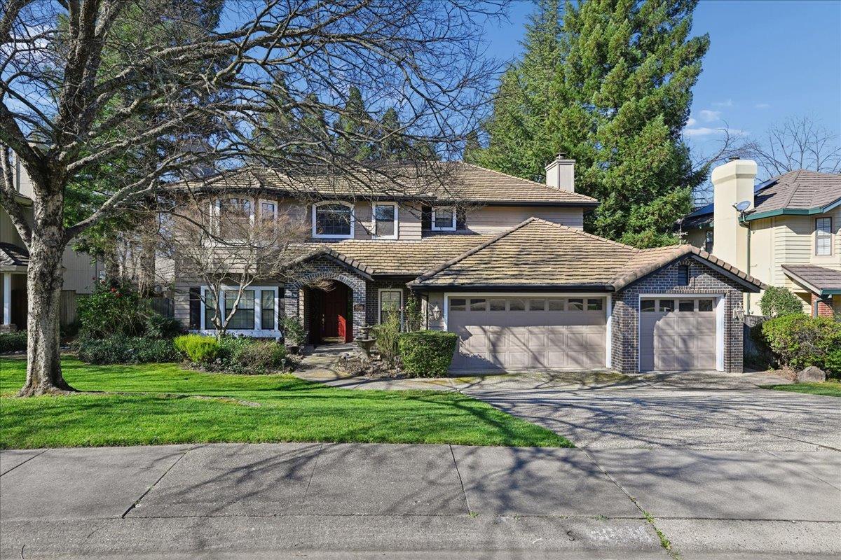 4608 Danvers Lane Granite Bay, CA 95746 - Photo 2 of 74 a front view of a house with garden