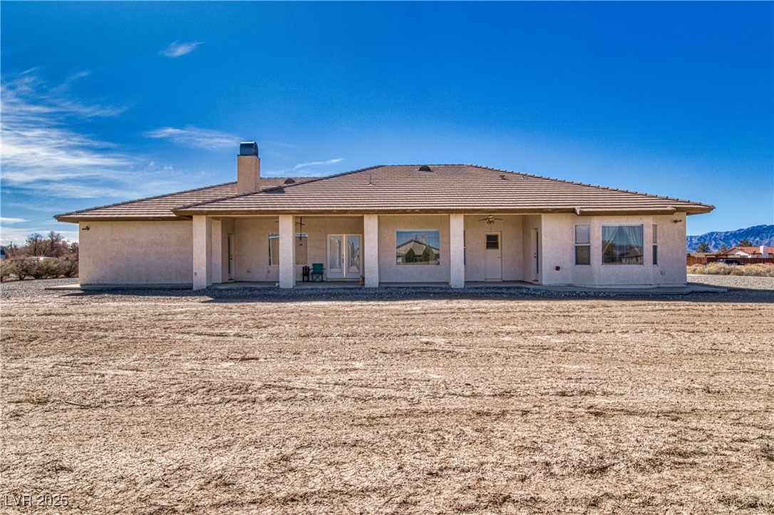 660 Indian Road Pahrump, NV 89048 - Photo 47 of 54 Huge 42 X 13 covered patio w/ textured concrete flooring.