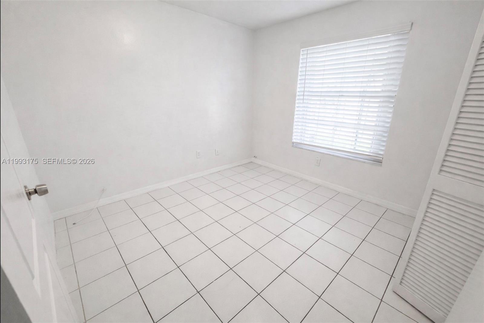 12695 Southwest 144th Terrace Miami, FL 33186 - Photo 16 of 43 a view of room and window