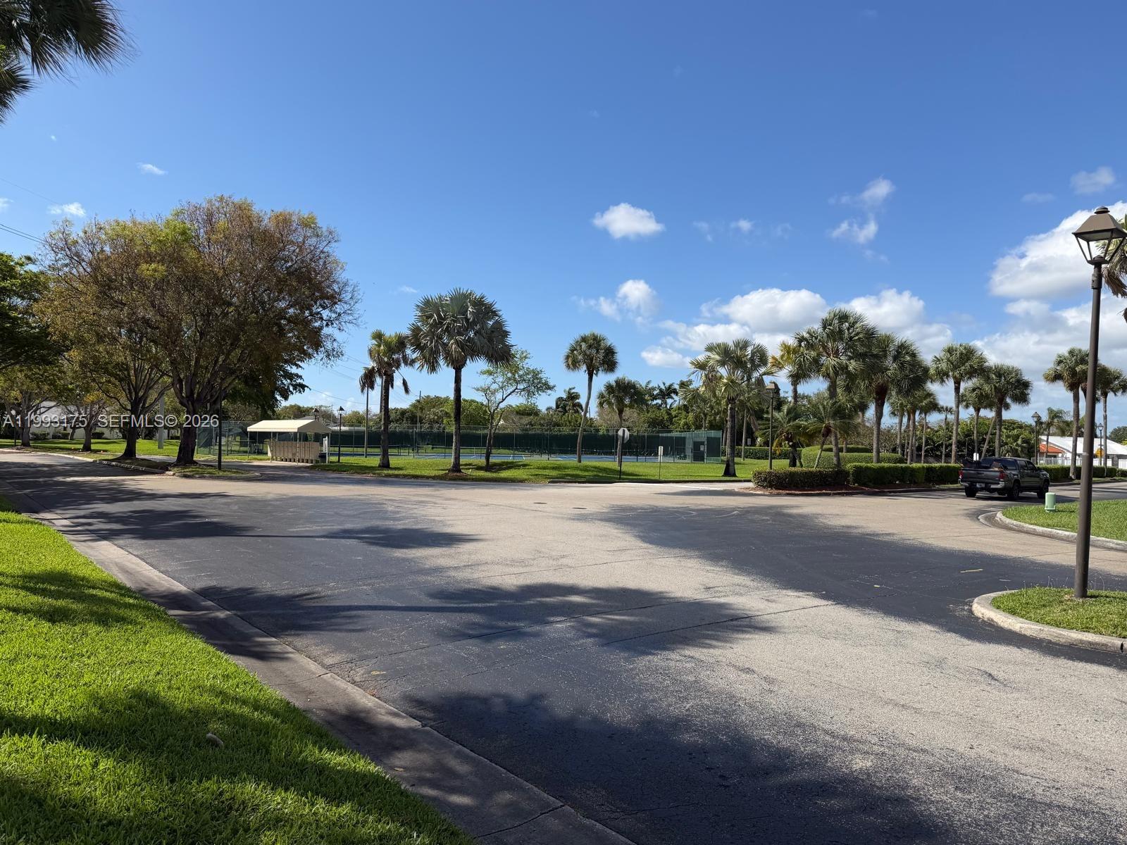 12695 Southwest 144th Terrace Miami, FL 33186 - Photo 26 of 43 a view of street with a houses