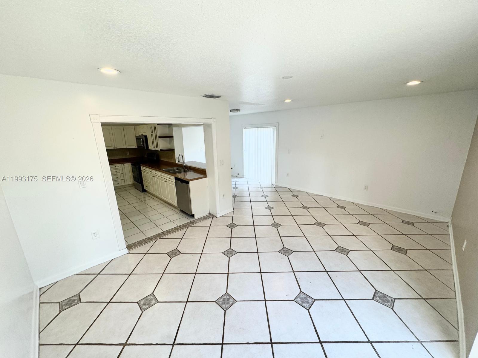 12695 Southwest 144th Terrace Miami, FL 33186 - Photo 30 of 43 a view of an empty room