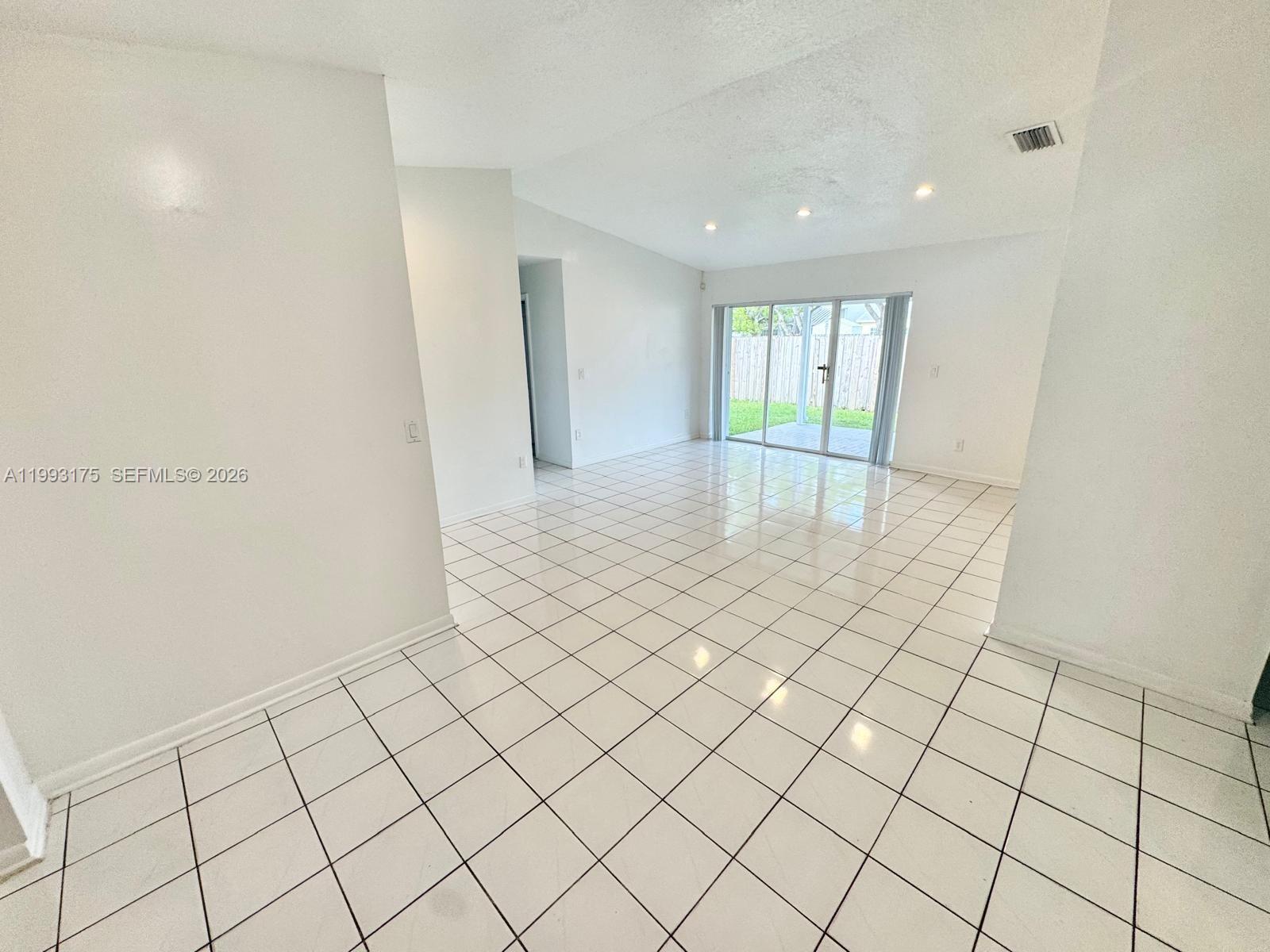 12695 Southwest 144th Terrace Miami, FL 33186 - Photo 37 of 43 a view of an empty room and window