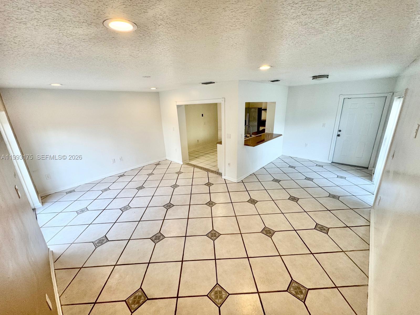 12695 Southwest 144th Terrace Miami, FL 33186 - Photo 43 of 43 a view of an empty room and bathroom