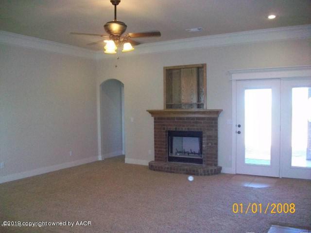 18250 Copper Ridge Bushland, TX 79124 - Photo 3 of 8 a view of an empty room with a fireplace