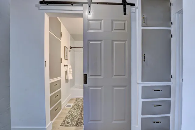 a view of a kitchen with a sink and a stove