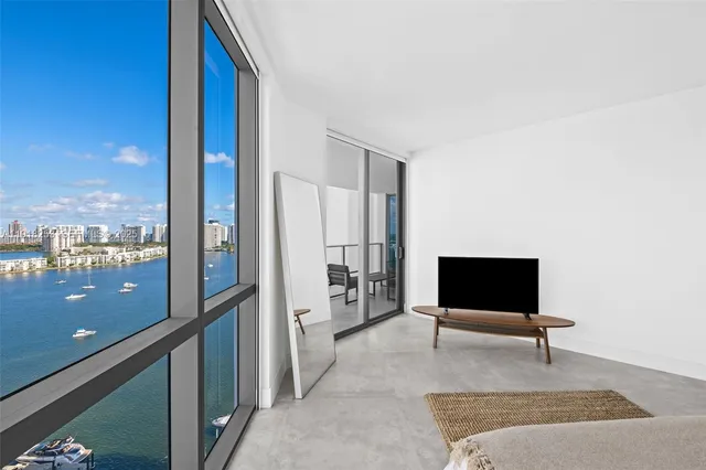 a bathroom with a shower and a toilet