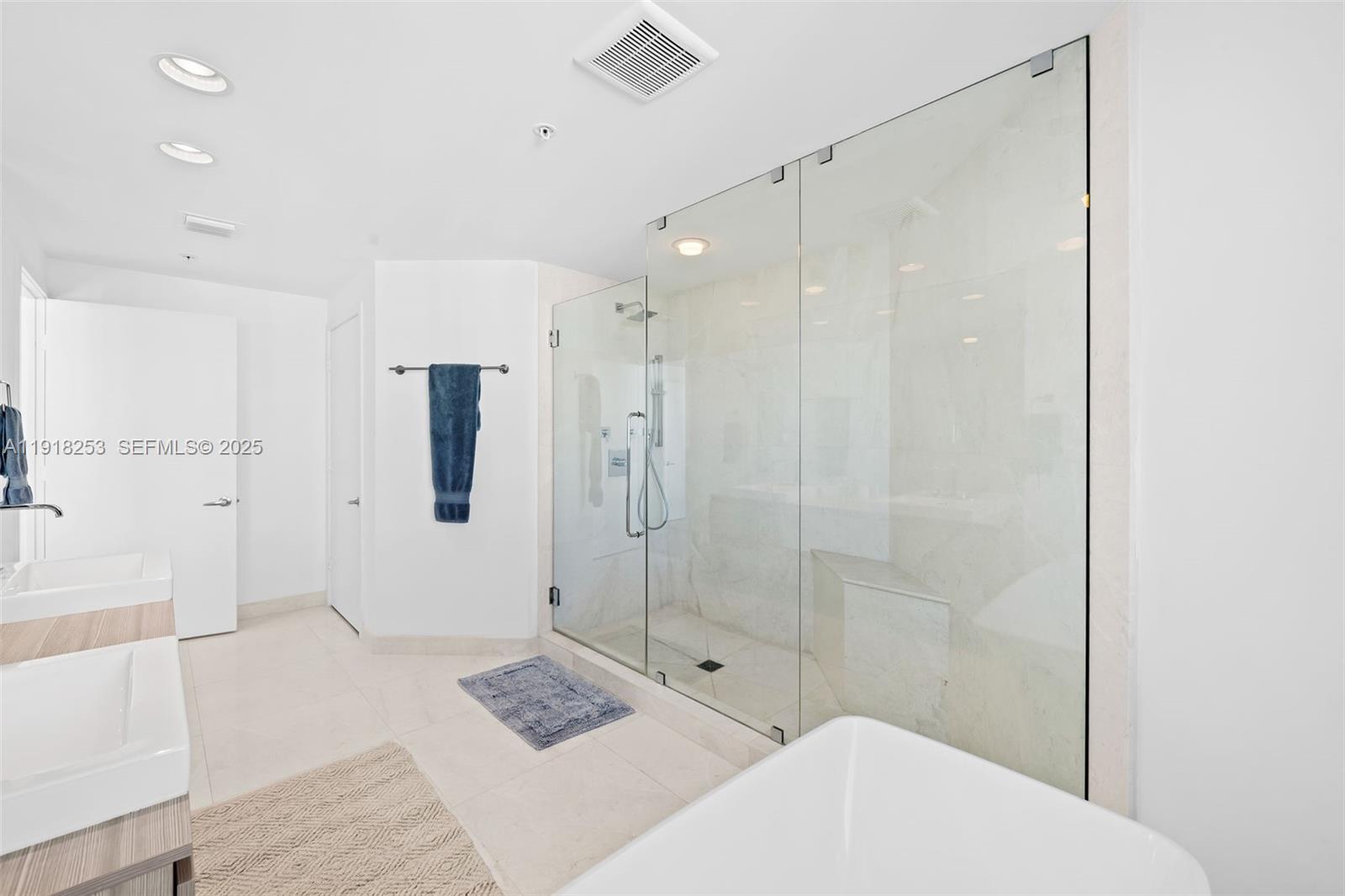 17111 Biscayne Boulevard, Unit 2103 North Miami Beach, FL 33160 - Photo 13 of 33 a bathroom with a shower and a toilet