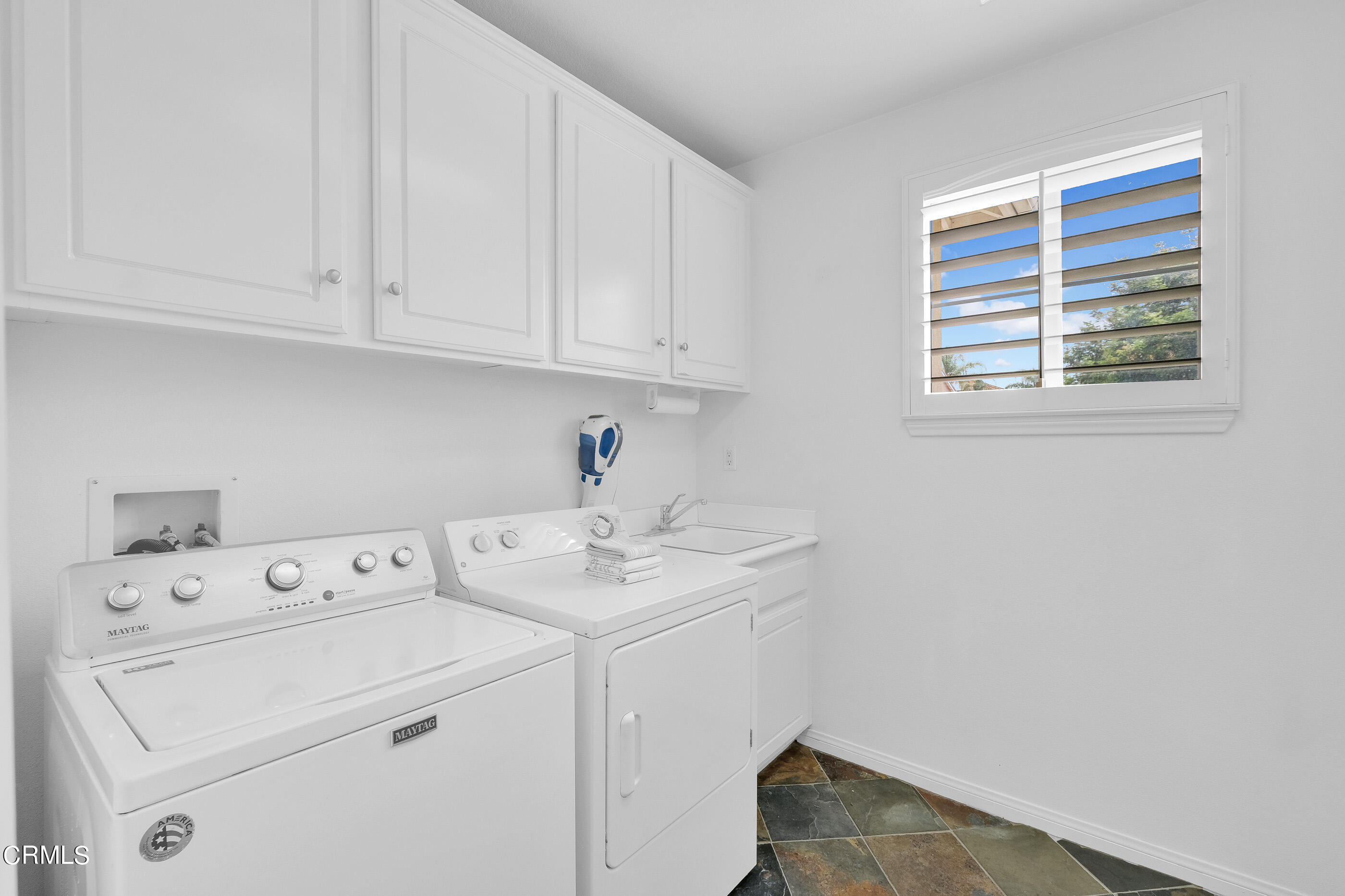 8317 Carriage Court Riverside, CA 92508 - Photo 19 of 37 a utility room with dryer and washer