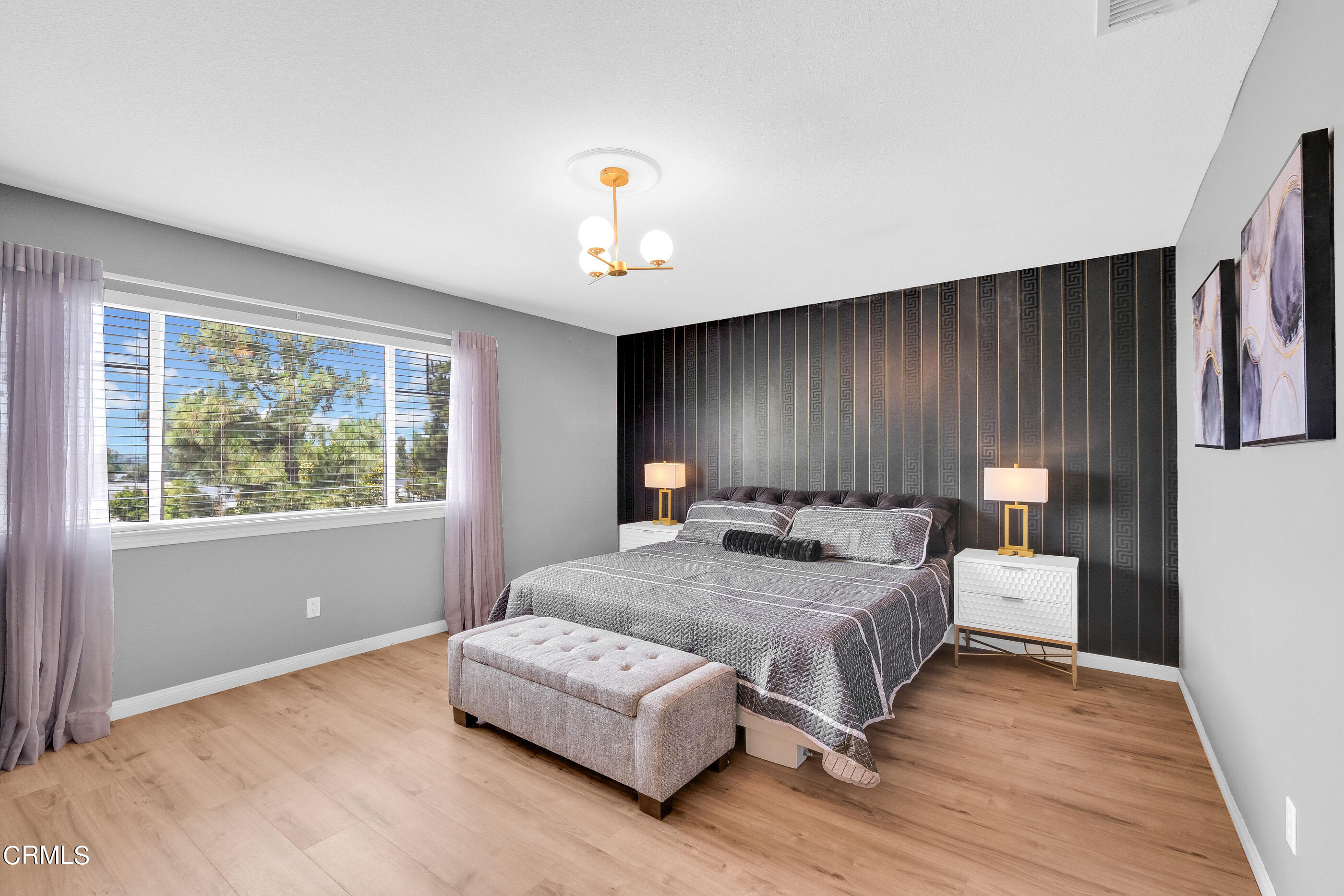 8317 Carriage Court Riverside, CA 92508 - Photo 24 of 37 a bedroom with a bed and window