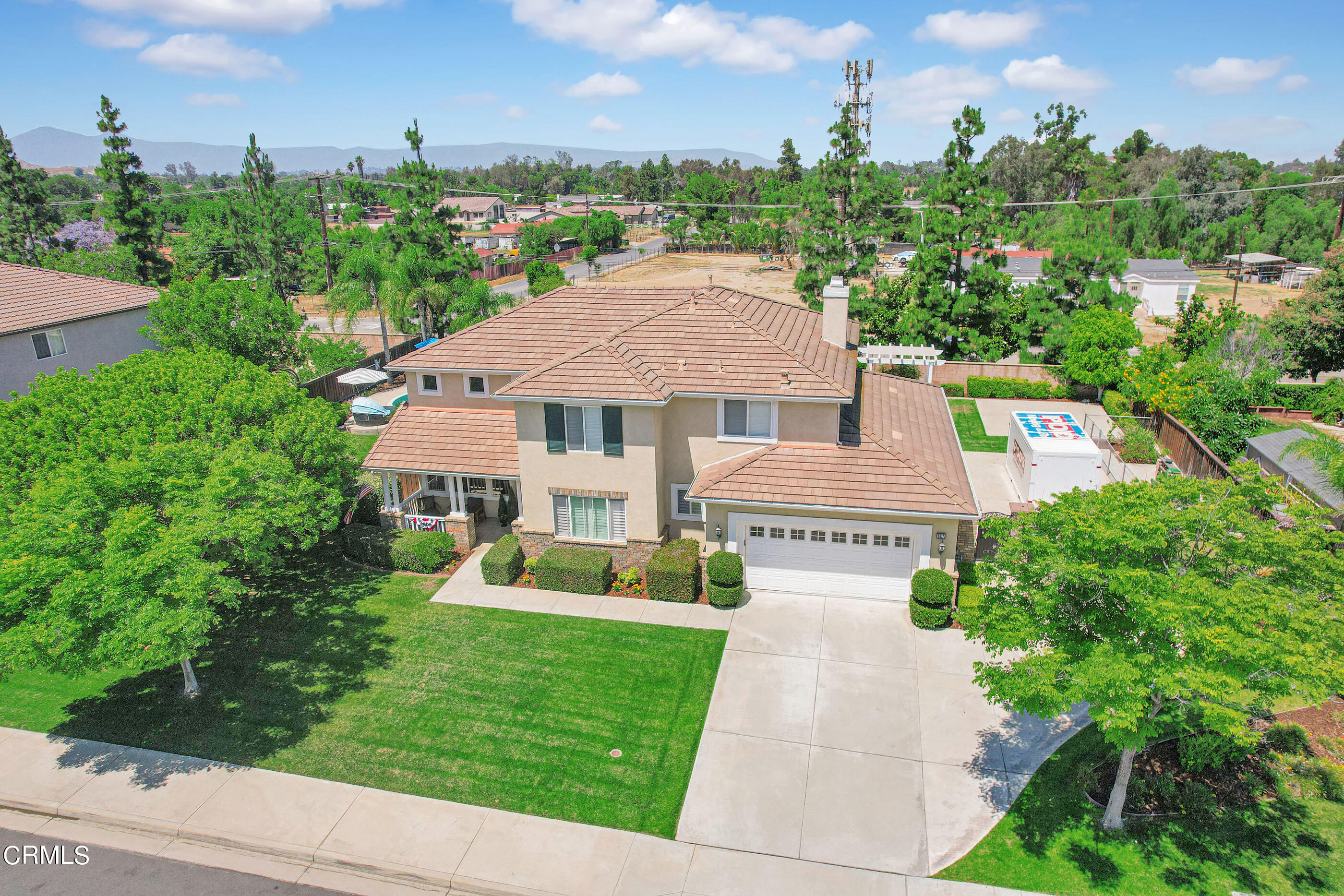 8317 Carriage Court Riverside, CA 92508 - Photo 4 of 37 a front view of a house with garden