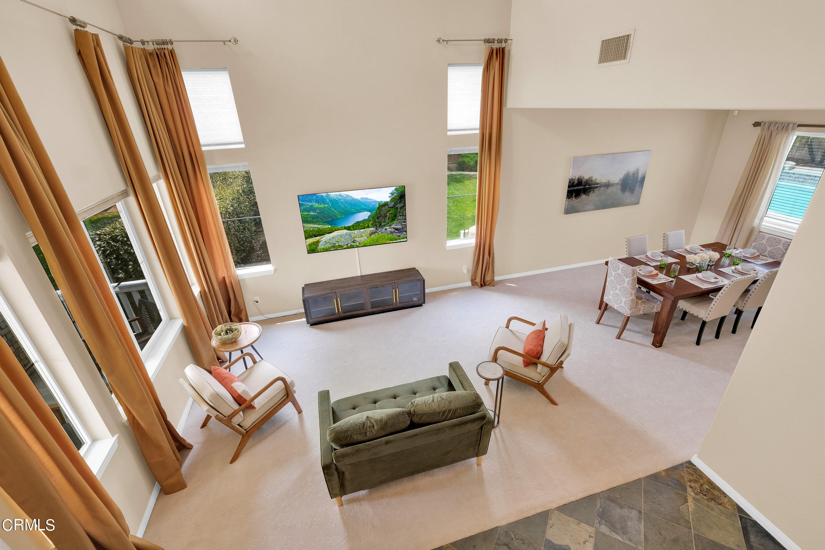 8317 Carriage Court Riverside, CA 92508 - Photo 10 of 37 a living room with furniture and a flat screen tv