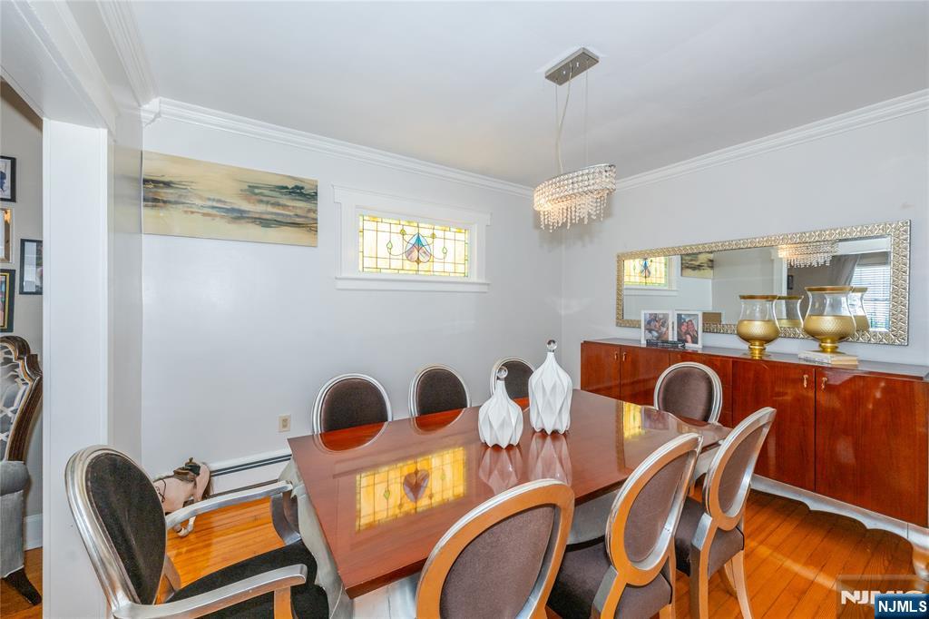 690 Garden Street Maywood, NJ 07607 - Photo 10 of 49 a dining room with furniture and window