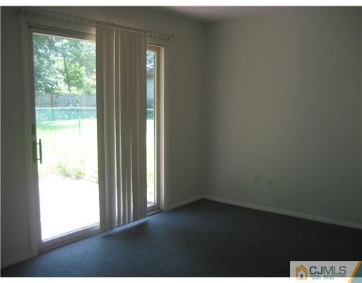 34 Idlewild Road Edison, NJ 08817 - Photo 4 of 7 an empty room with a window