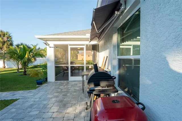 a view of backyard with hardwood