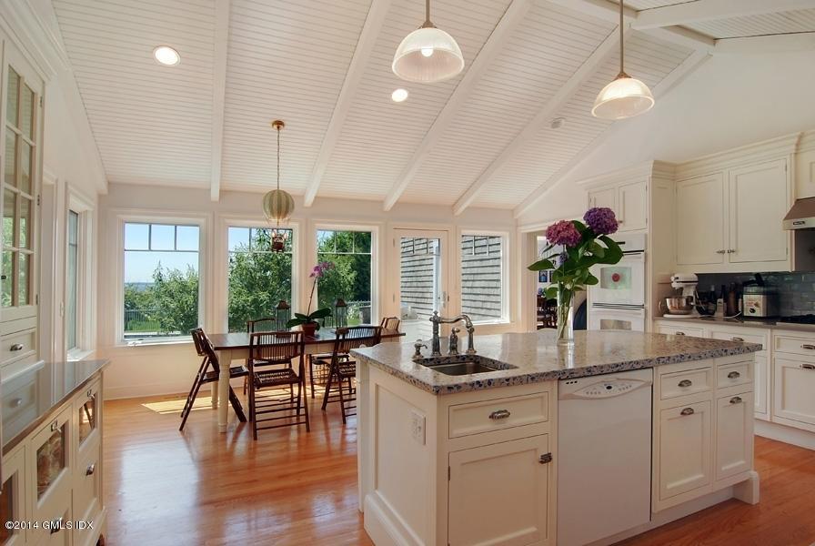 160 Shore Road Old Greenwich, CT 06870 - Photo 3 of 15 a kitchen with sink and cabinets