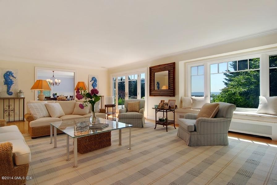 160 Shore Road Old Greenwich, CT 06870 - Photo 4 of 15 a living room with furniture and a large window