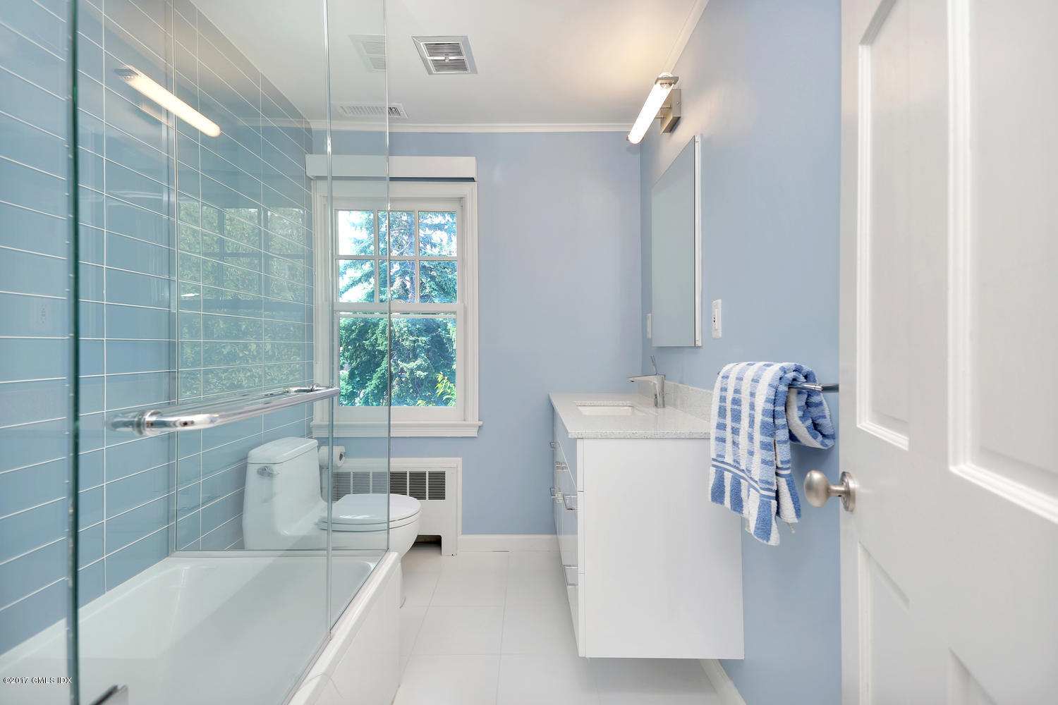 160 Shore Road Old Greenwich, CT 06870 - Photo 6 of 15 a bath room with a sink and a bath tub