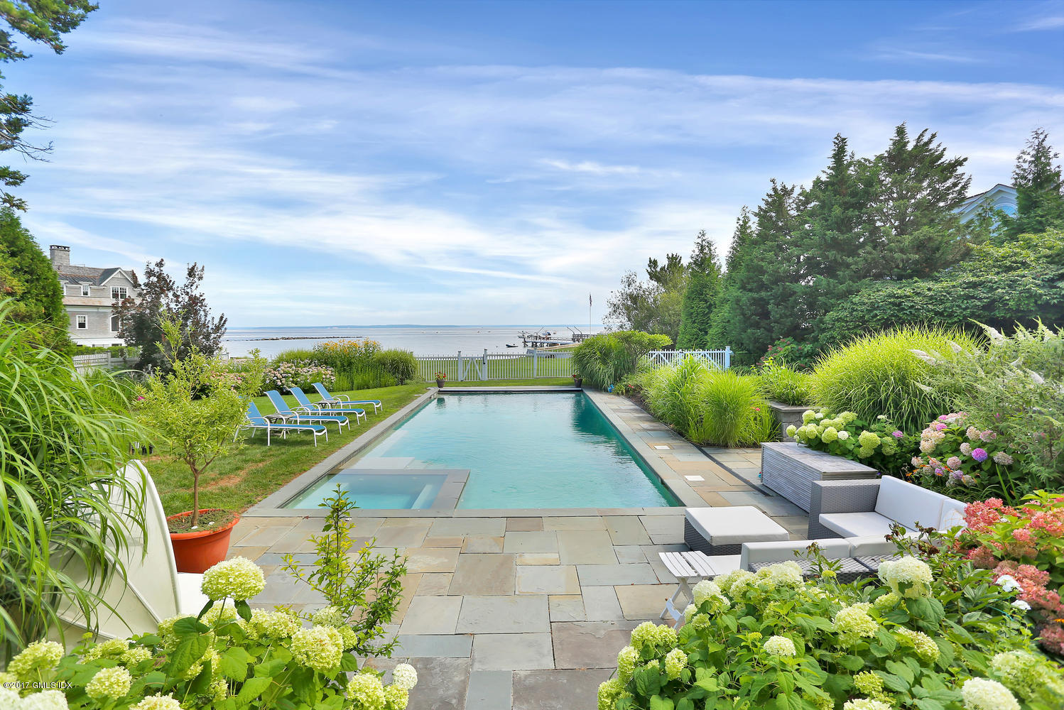 160 Shore Road Old Greenwich, CT 06870 - Photo 7 of 15 a view of a yard with plants