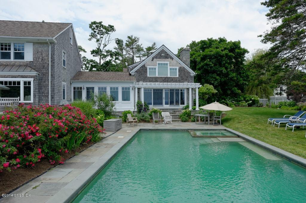 160 Shore Road Old Greenwich, CT 06870 - Photo 8 of 15 a house with garden in front of it