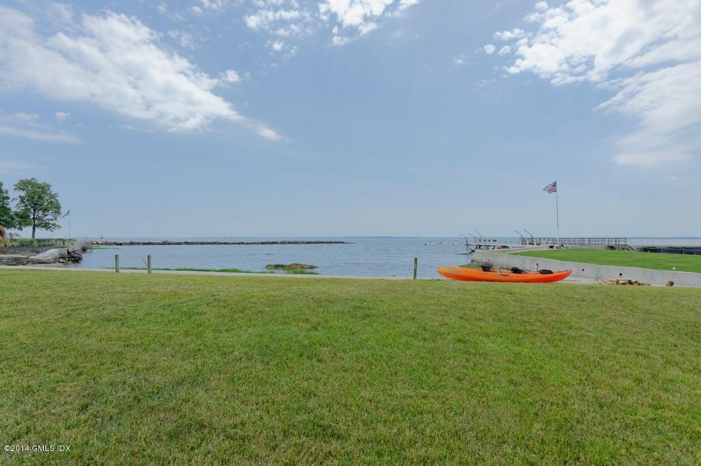 160 Shore Road Old Greenwich, CT 06870 - Photo 10 of 15 a view of an outdoor space and a yard