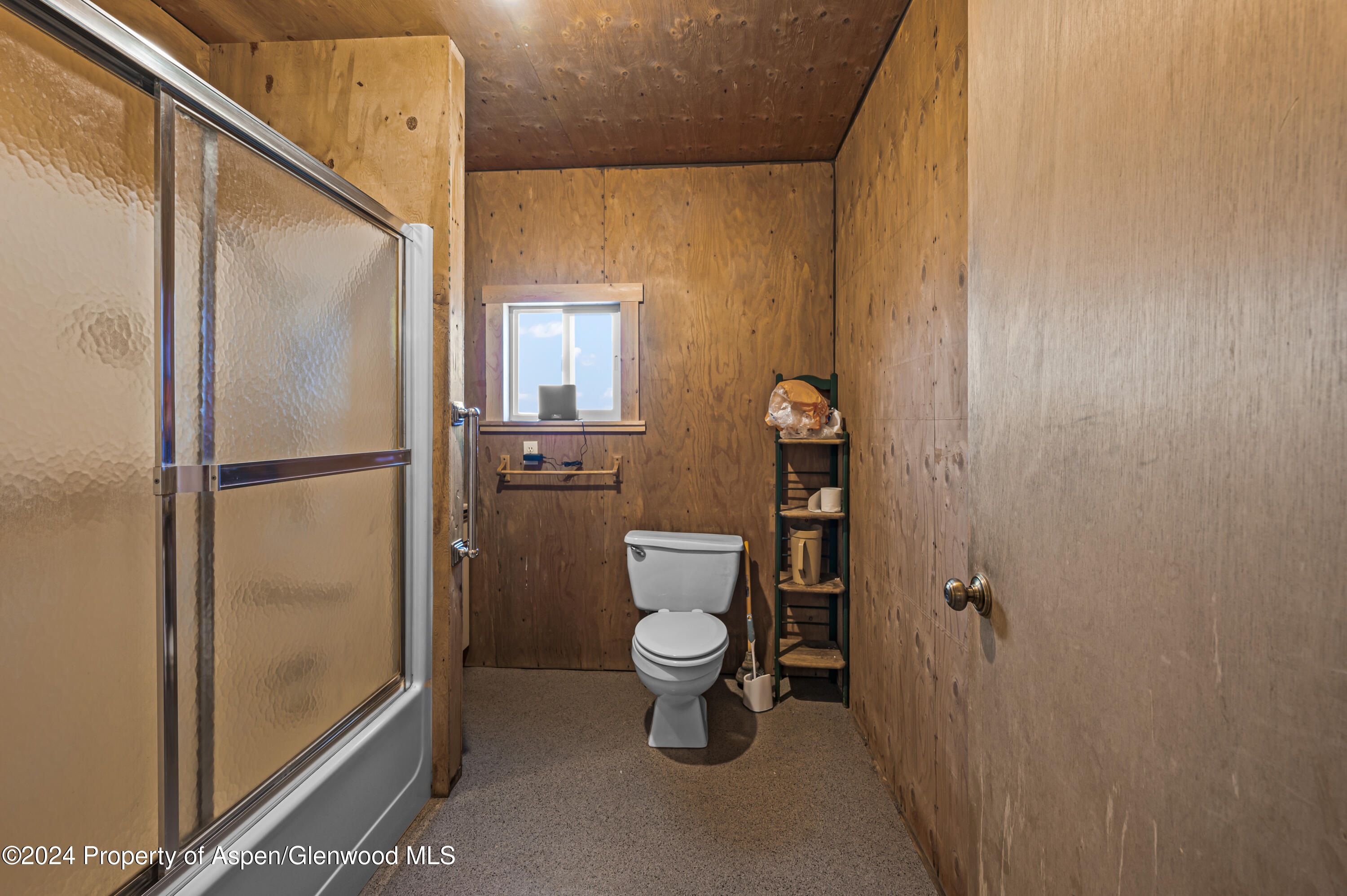 10444 County Road 320 Rifle, CO 81650 - Photo 19 of 48 a bathroom with a toilet and a shower