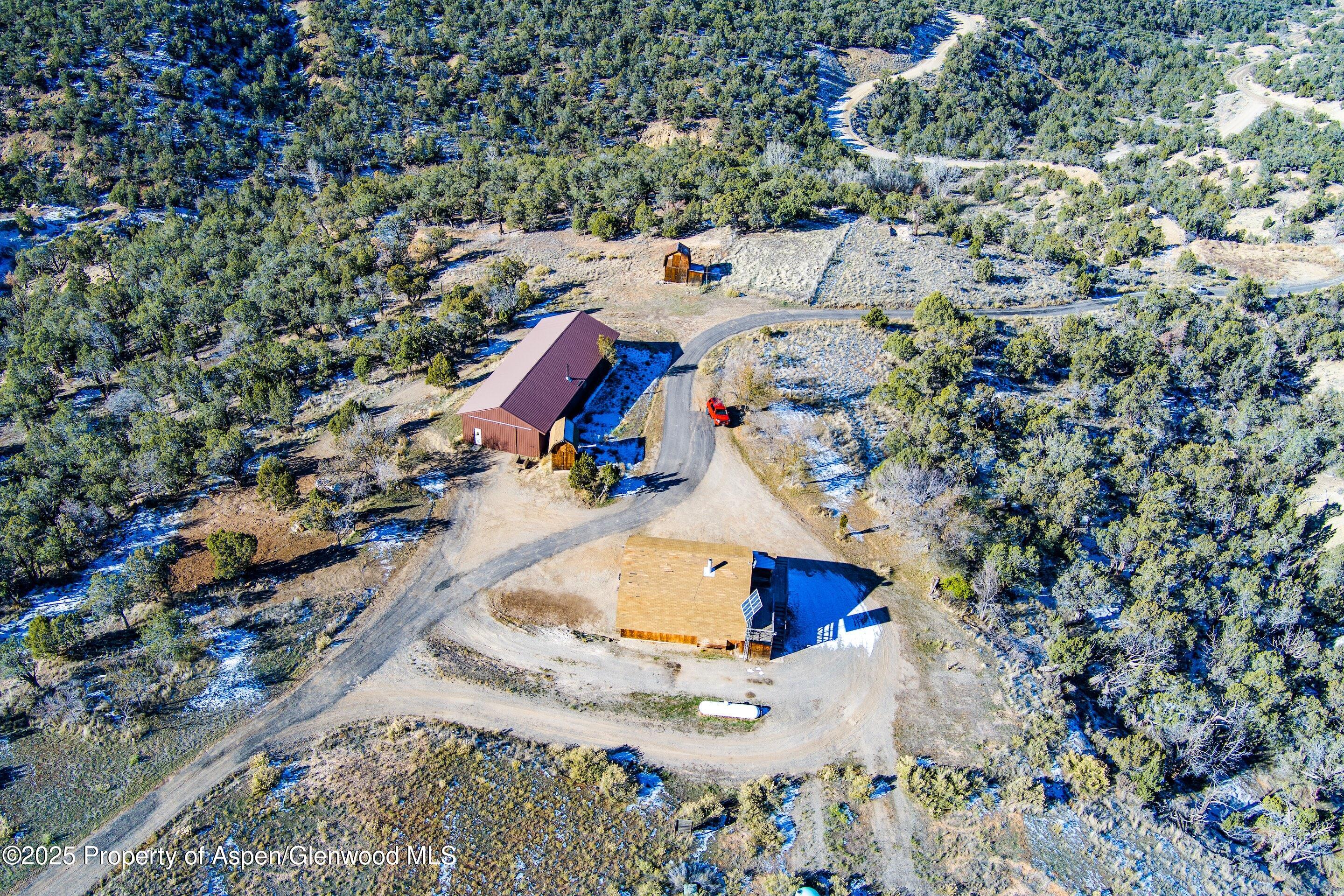 10444 County Road 320 Rifle, CO 81650 - Photo 44 of 48 an aerial view of residential houses with outdoor space