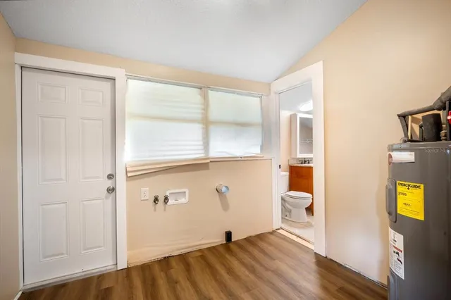 a view of a bathroom with utility room