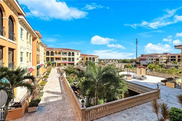 a bedroom with a bed and a dresser in it