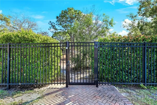 a view of a hall with wooden floor