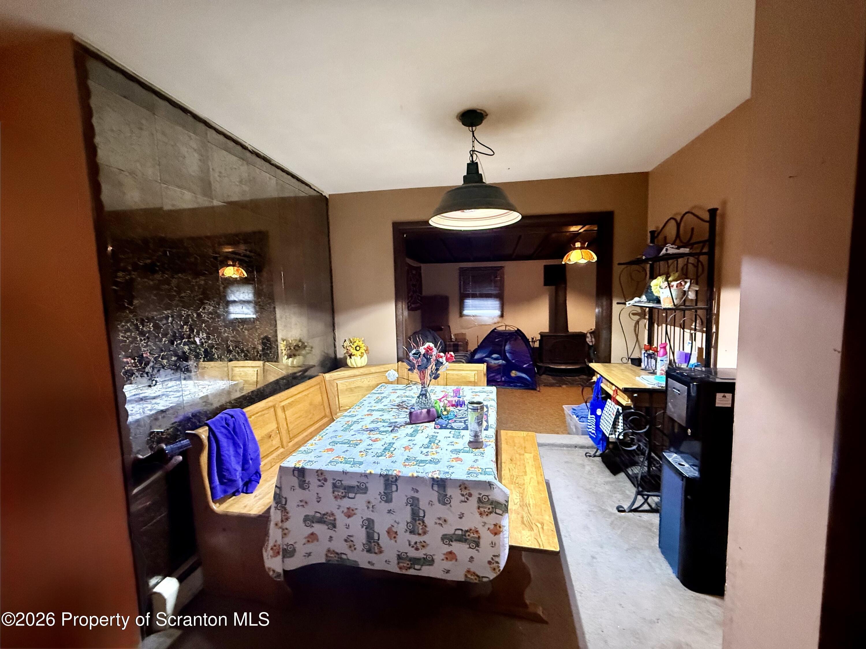 2712 Lafayette Street Scranton, PA 18504 - Photo 13 of 18 a living room with furniture and a chandelier
