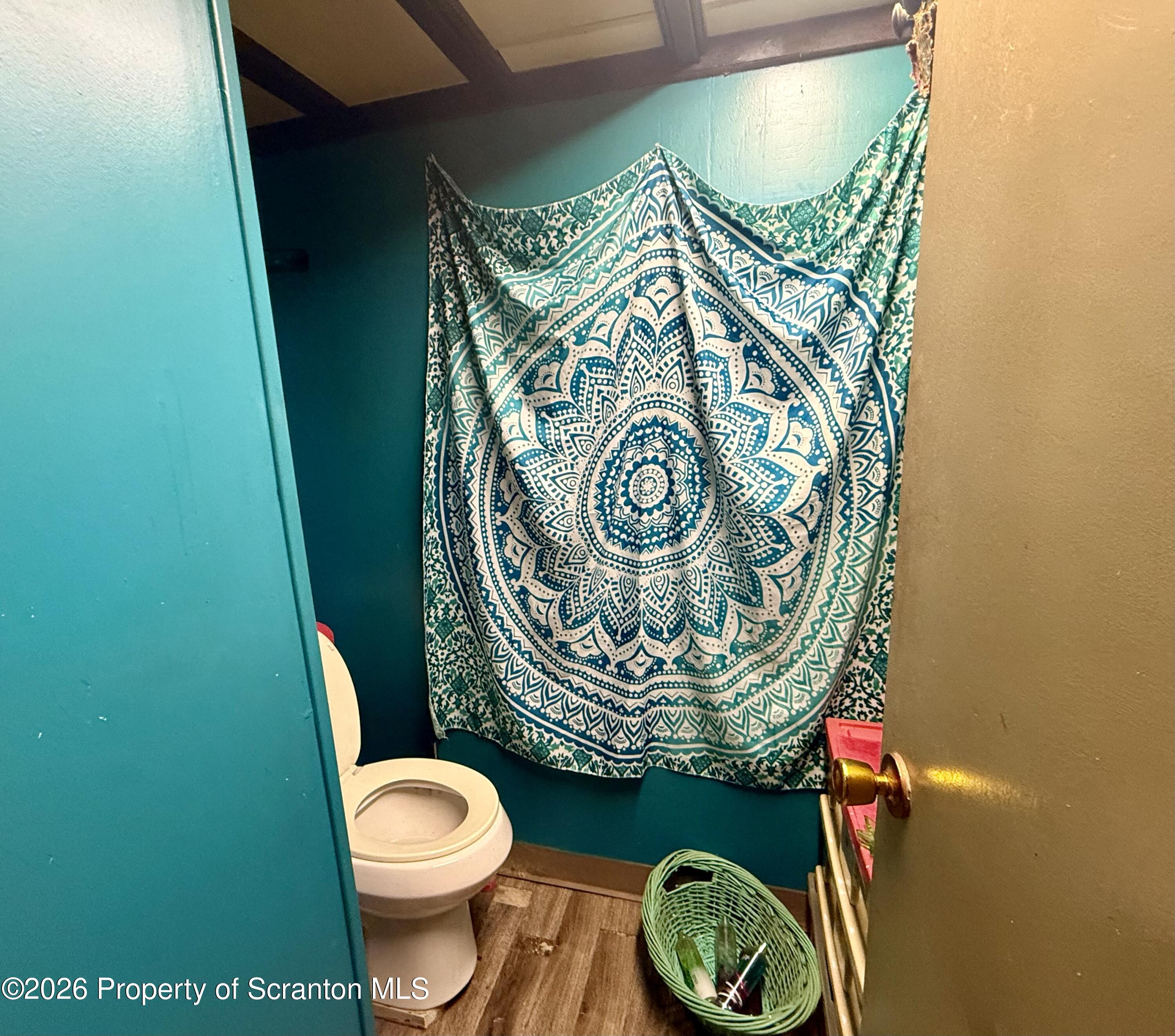 2712 Lafayette Street Scranton, PA 18504 - Photo 7 of 18 a bathroom with a toilet and a sink