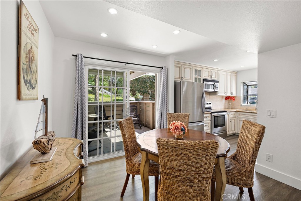 34044 Selva Road, Unit 150 Dana Point, CA 92629 - Photo 9 of 38 a view of a dining room with furniture window and outside view