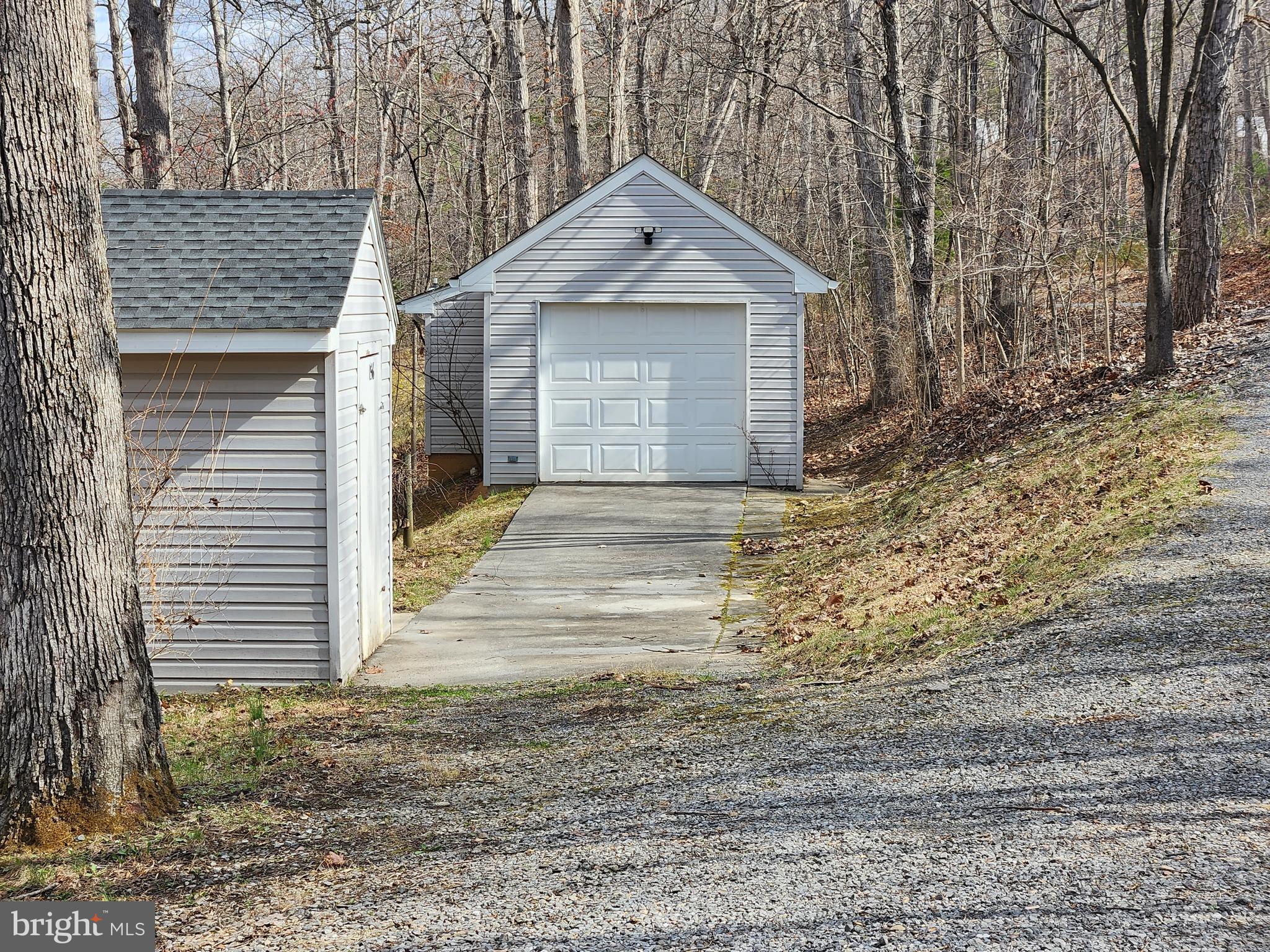 156 Dry Run Court Front Royal, VA 22630 - Photo 23 of 34 a front view of a house with a yard and garage