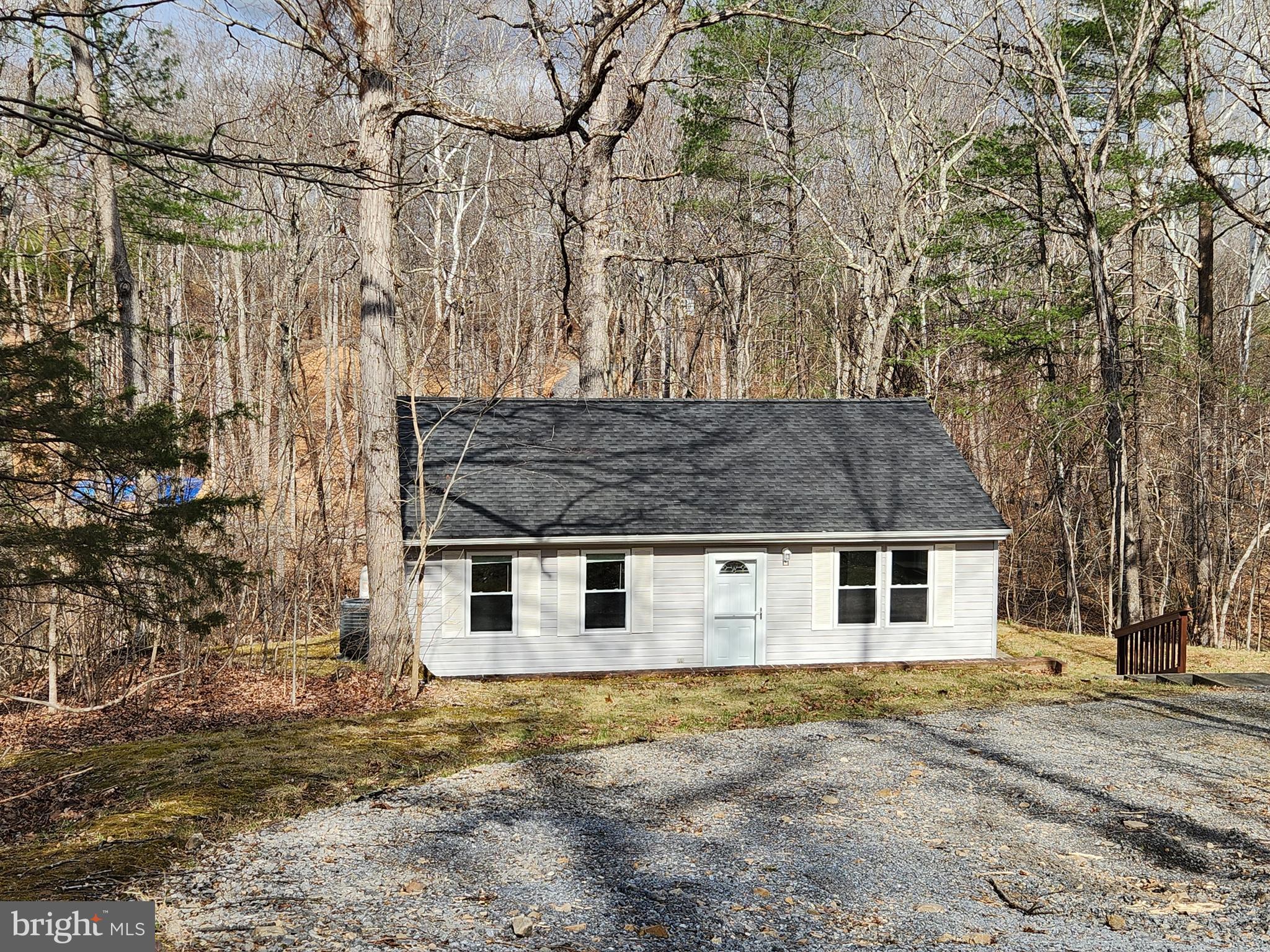 156 Dry Run Court Front Royal, VA 22630 - Photo 24 of 34 a view of a white house with a large tree