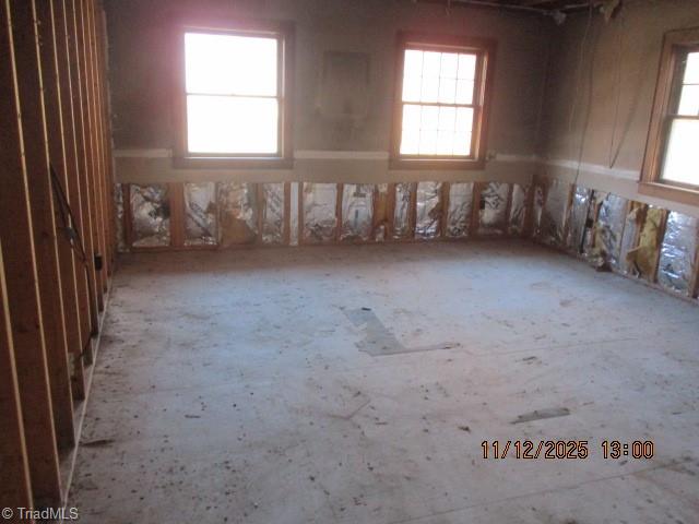 909 Outback Drive Ronda, NC 28670 - Photo 13 of 18 second floor master bedroom w damage