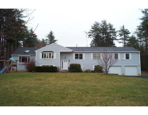 43 Breakneck Road Sturbridge, MA 01566 - Photo 1 of 6 a view of a house with a yard and deck