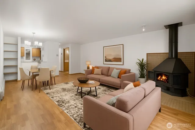 a living room with furniture and a lamp