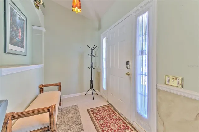 a view of room with a hallway