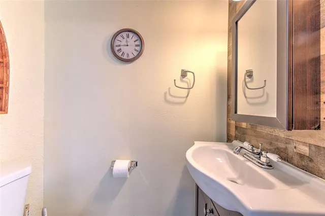 a bed room with a bed and a window