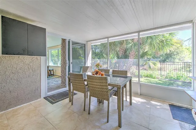 a view of a park with swings and slides