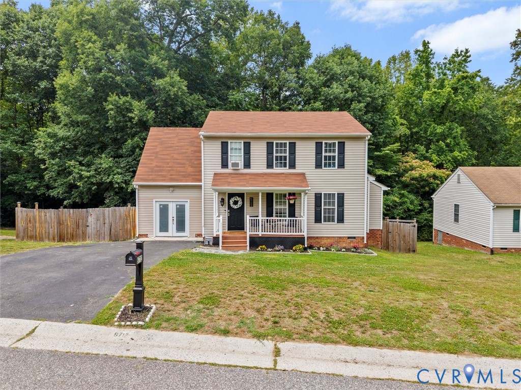 6712 Hedges Road Richmond, VA 23224 - Photo 2 of 34 Two-story residence featuring light-colored siding