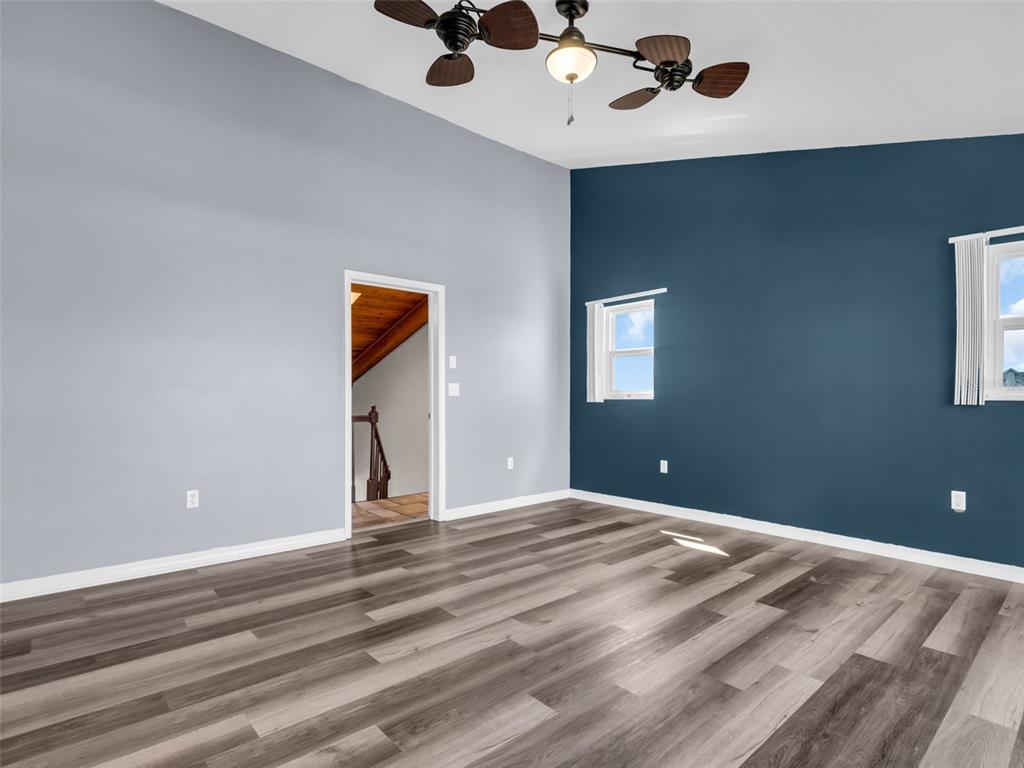 6241 Bayside Drive New Port Richey, FL 34652 - Photo 25 of 78 a view of a livingroom with a chandelier