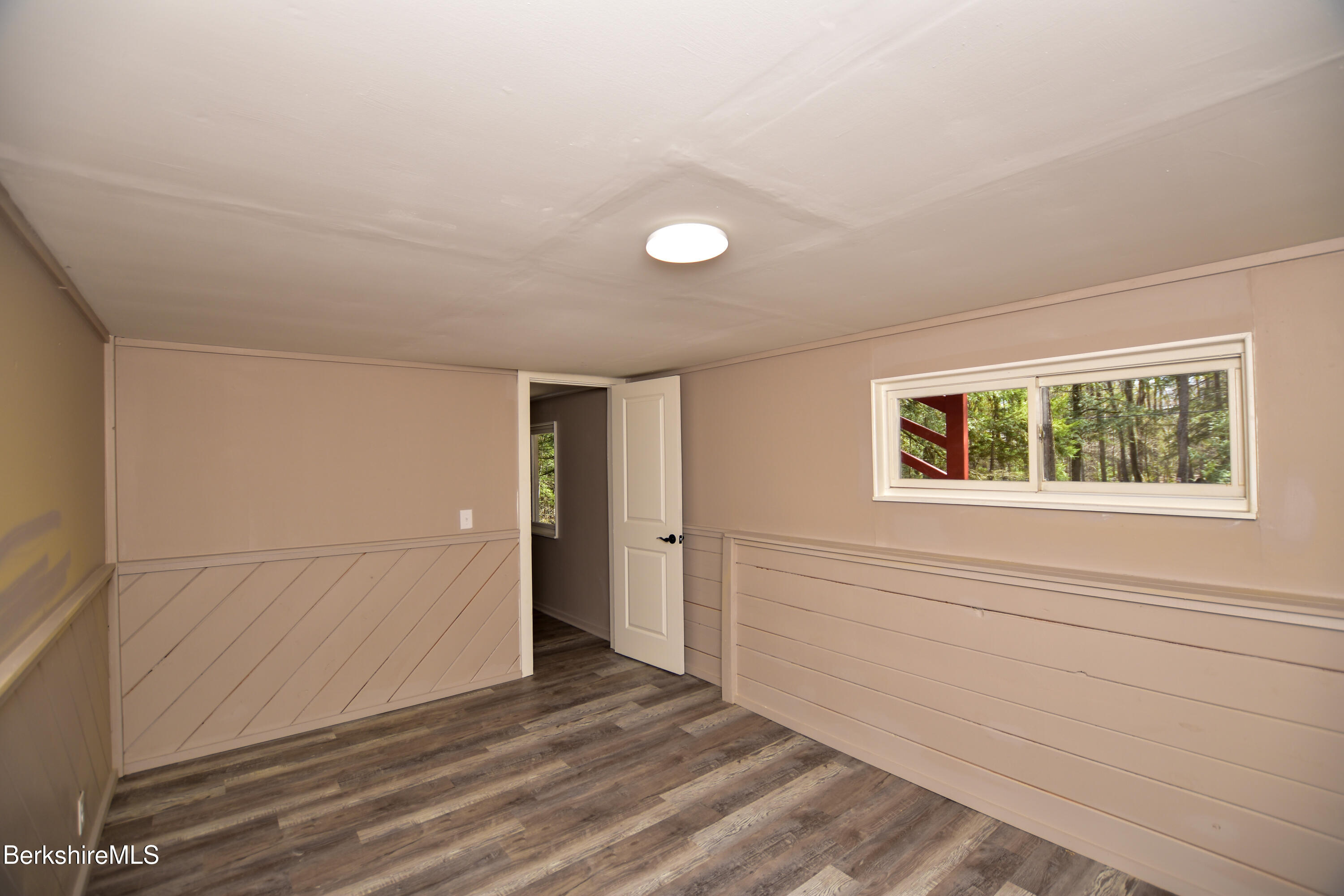 859 Moberg Road Becket, MA 01223 - Photo 27 of 29 lower level 3rd bedroom
